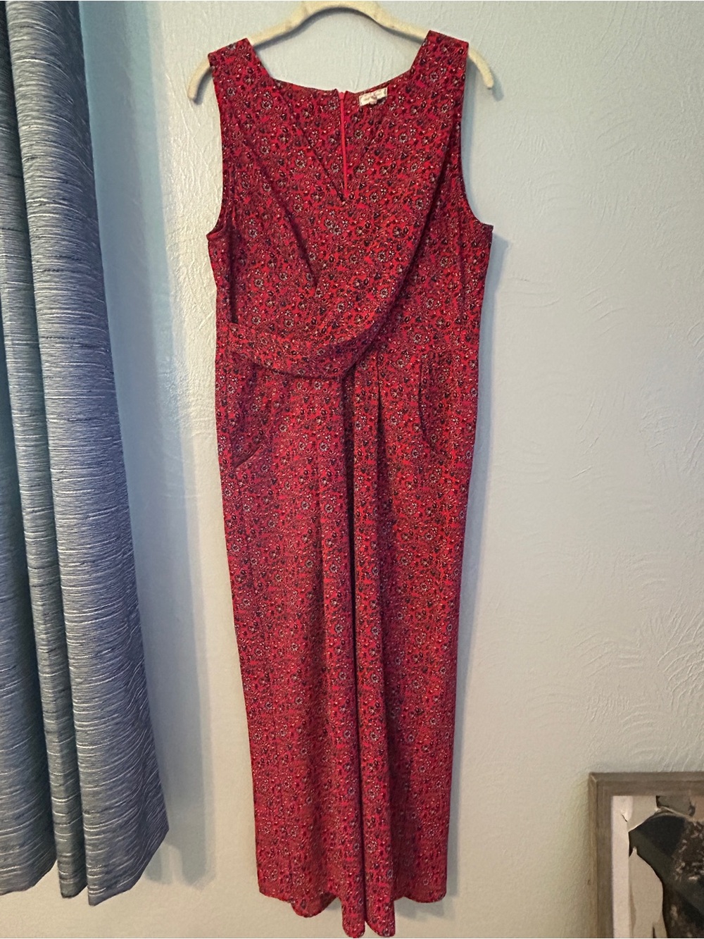 Woman’s red floral print jumper